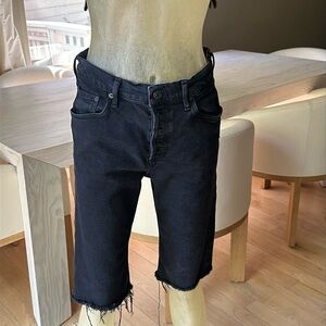 Black knee length button fly Agolde Jean stretch shorts. Size 29.